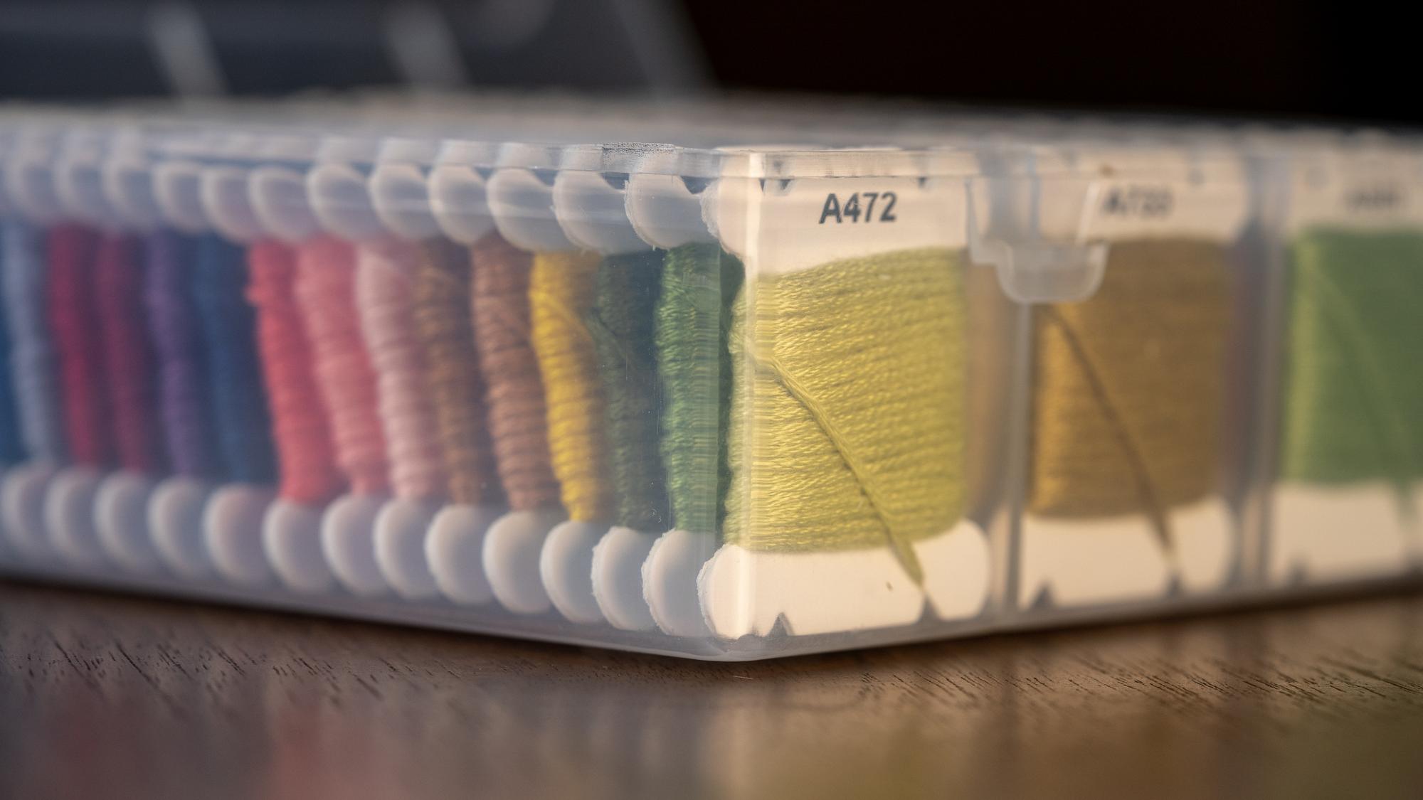 Stack of embroidered samples for pricing